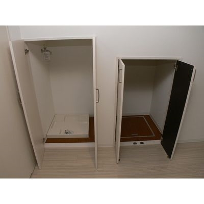 洗濯機置場はドアで隠せます