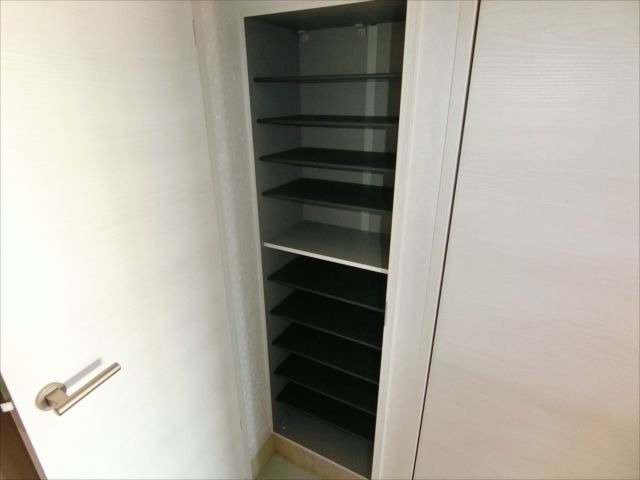 靴はこちらへ。