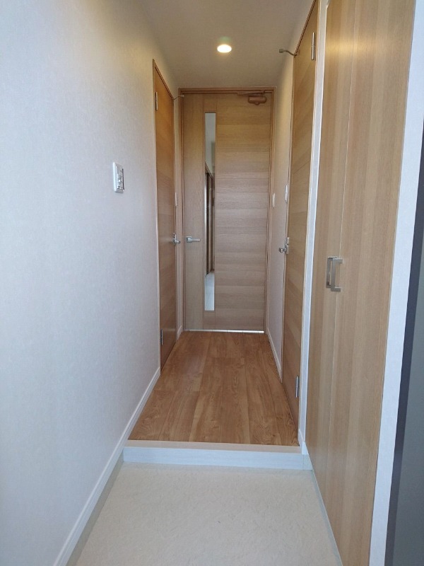 木目調の玄関は温かみがありますね