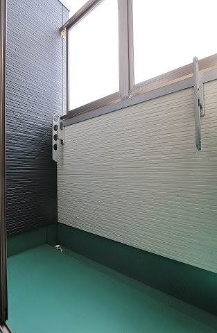 天気の良い日の洗濯物はこちらでされてください