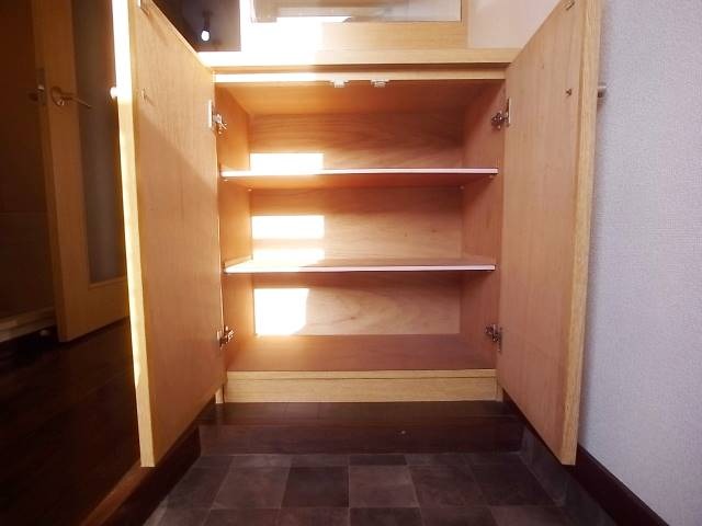 靴はこちらへ。