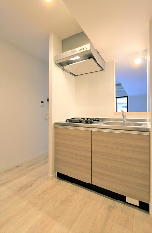 ２口コンロのシステムキッチンで料理もはかどります