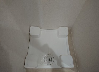 洗濯機はここに、