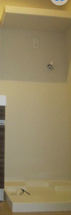 洗濯機はここ。