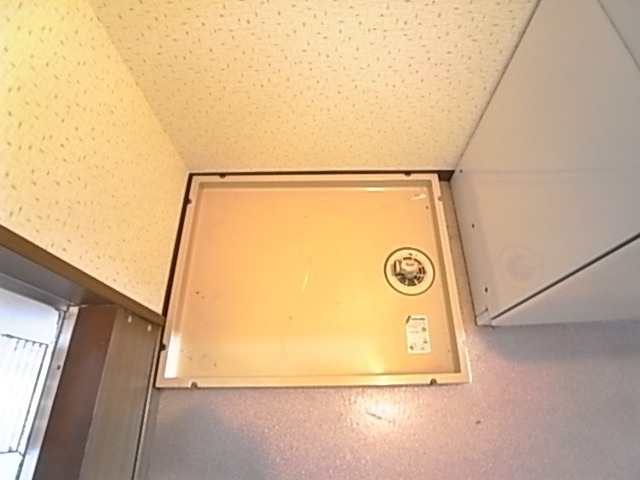 洗濯機はここ。