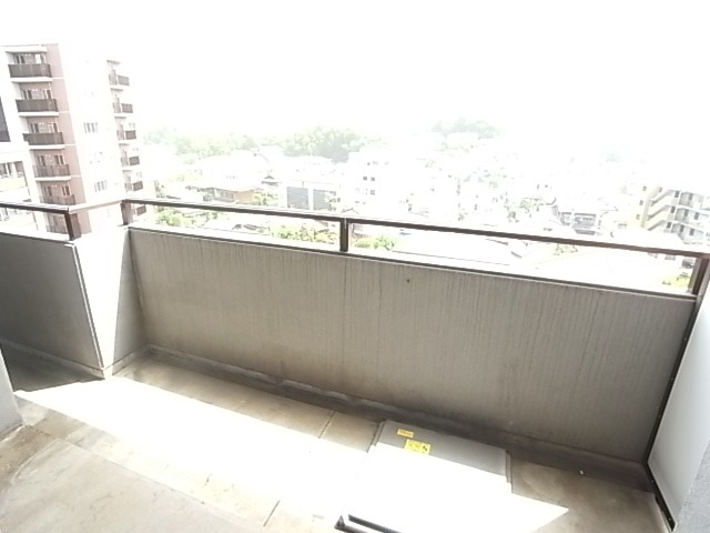 洗濯機はここ。
