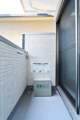 洗濯物はこちらに干してください